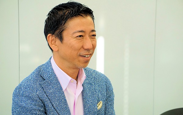 写真1：オプト 鉢嶺氏
